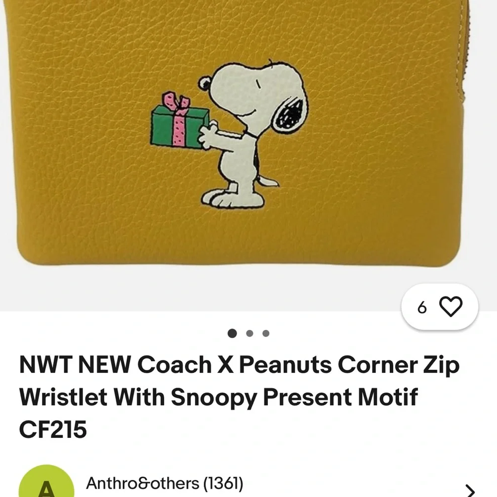 Coach Yellow Snoopy Wristlet - Picture 2 of 2
